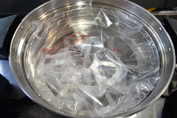 Brand new Avantco 177CU100ETL stainless steel coffee urn, double wall, 100 cup capacity, in packaging, minor scratches.