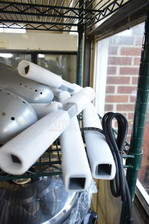 Brand new ServIt 423BLS3 Suspension Bar with 3 Bulb Heat Lamp, 120V, scratch and dent, foam-wrapped metal parts visible.