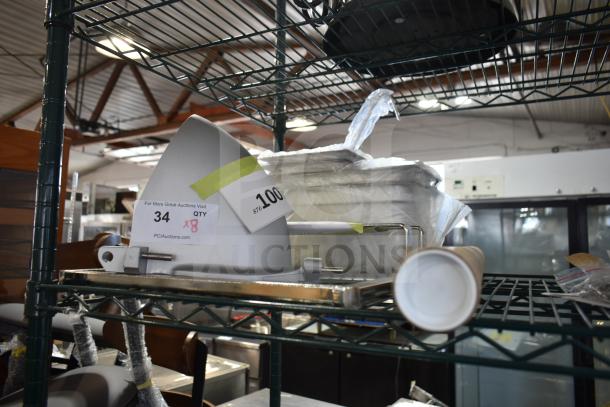 Eight new scratch and dent items including Vulcan heater and Avantco slicer cover, labeled with auction quantity and lot info.