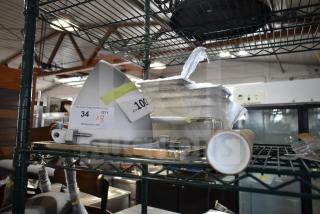 Eight new scratch and dent items including Vulcan heater and Avantco slicer cover, labeled with auction quantity and lot info.