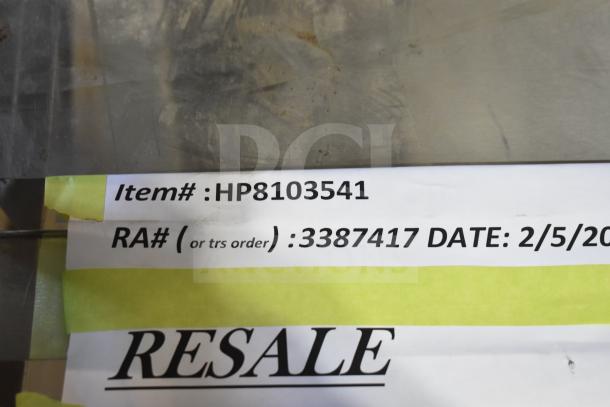 Item tag showing "Item# HP8103541," RA# 3387417, and date 2/5/2023 indicating resale details.