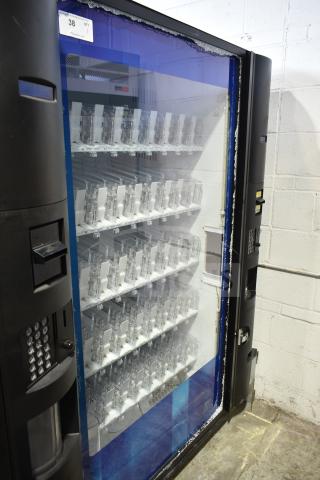 Crane 5800-4 vending machine, holds bottled drinks, with bill acceptor, 115 volts, 1 phase, minor visible damage.