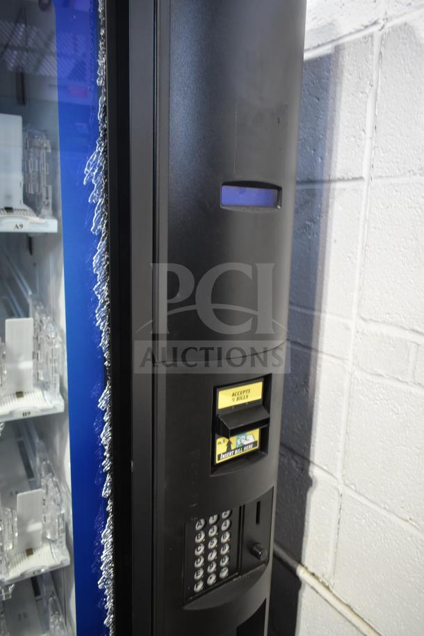 Crane 5800-4 vending machine, commercial model with bill acceptor, visible damage on the side, 115V, 1 phase.