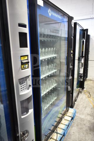 Crane 5800-4 vending machine with bill acceptor, commercial model, glass front, good condition, 115V, 1 phase.