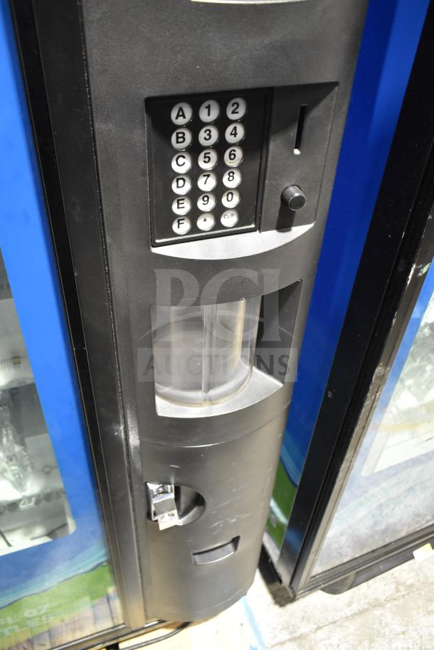 Crane 5800-4 vending machine with keypad, bill acceptor, and glass front, for bottled drinks. 115 volts, 1 phase.