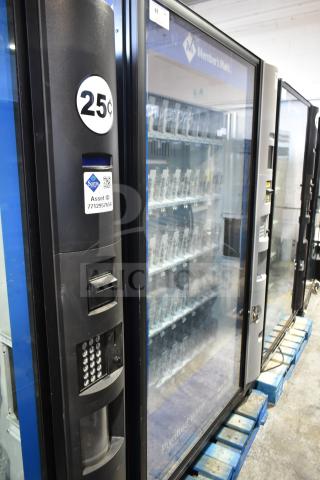 Crane 5800-4 commercial vending machine with bill acceptor, 115 volts, 1 phase, 25¢ display, asset ID label visible.