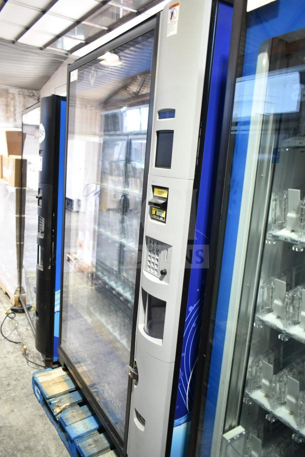 Crane 5800-4 commercial drink vending machine with bill acceptor, 115 volts, 1 phase, in good condition, blue accents.