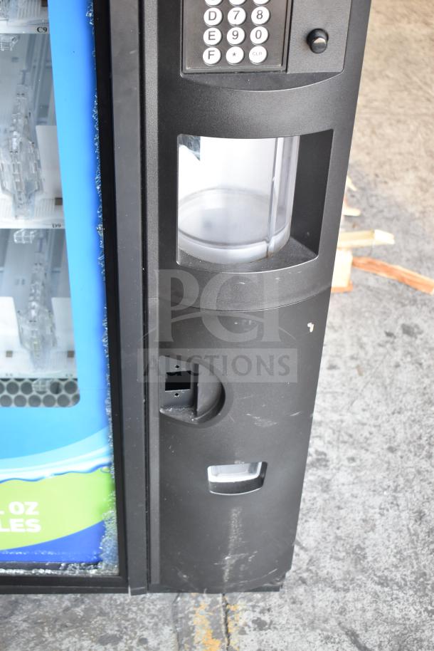 Crane 5800-4 commercial drink vending machine with bill acceptor, visible glass damage, 115 volts, 1 phase.