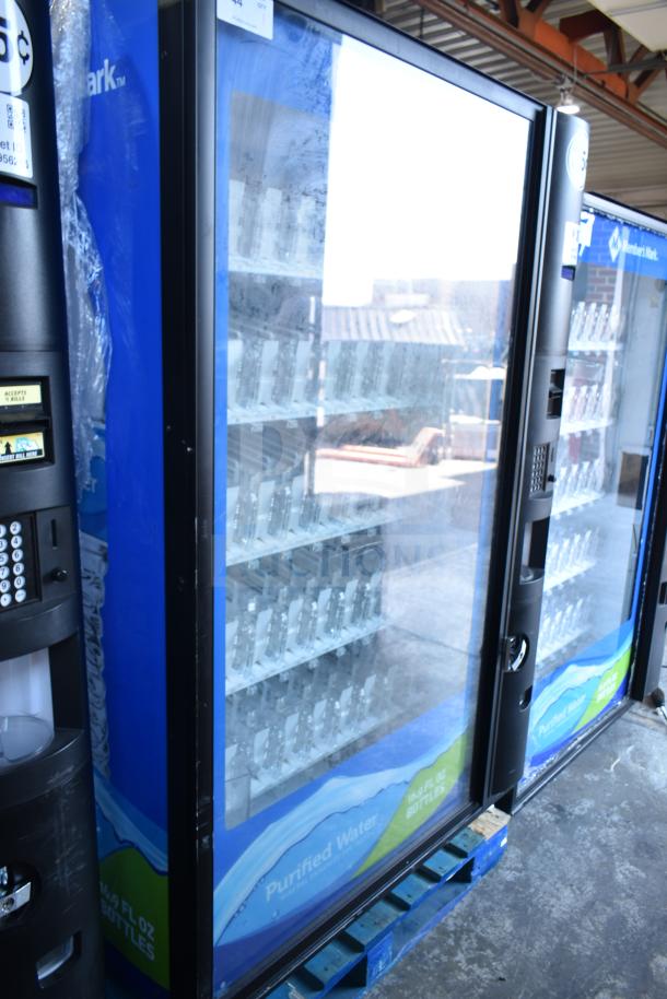 Crane 5800-4 vending machine, accepts bills, holds bottled drinks, commercial use, 115 volts, 1 phase, excellent condition.