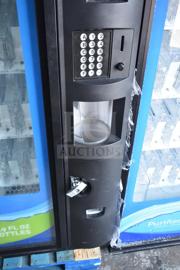 Crane 5800-4 vending machine with bill acceptor, keypad, and coin slot. 115 volts, 1 phase. Commercial use.