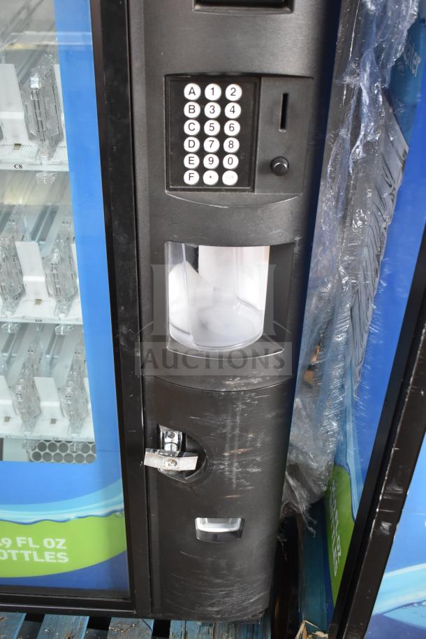 Crane 5800-4 commercial bottled drink vending machine with bill acceptor, keypad, and beverage selector. 115 volts, 1 phase.