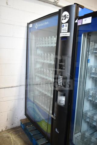 Crane 5800-4 commercial drink vending machine with bill acceptor, black finish, clear front, 115 volts, 1 phase, good condition.