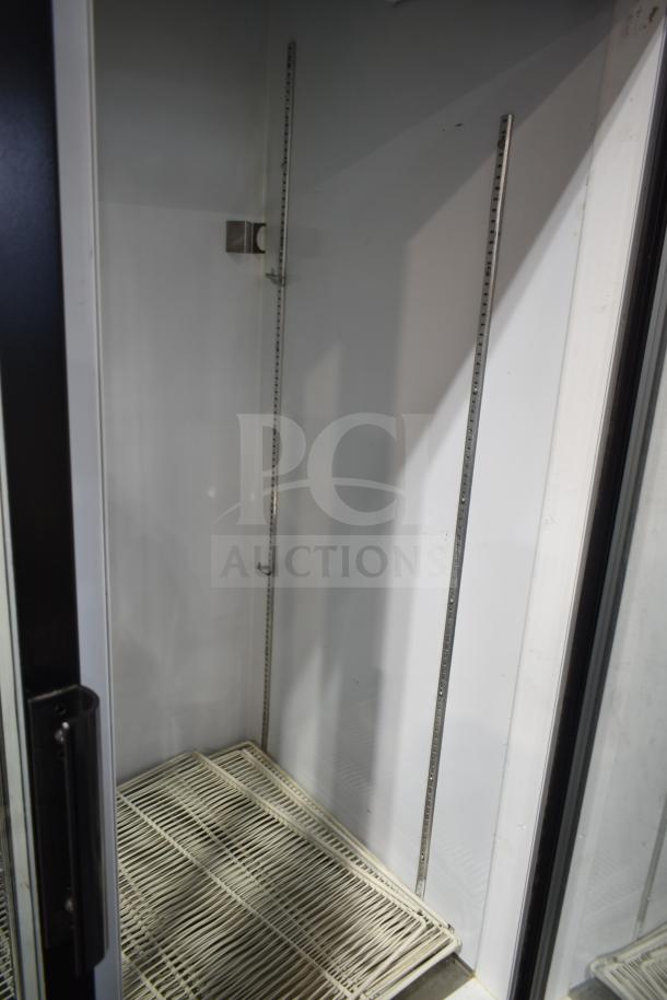 So-Low DHF4-49GD commercial 2-door reach-in freezer, glass doors, adjustable shelves, 115V, 1 phase, interior view.