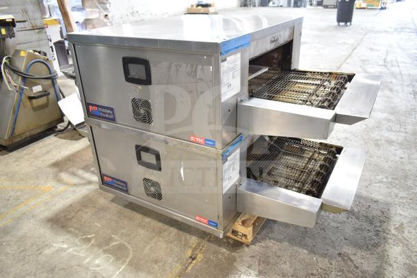 Two 2022 Middleby Marshall CTX DZ33T stainless steel electric conveyor pizza ovens on casters, tested and working.