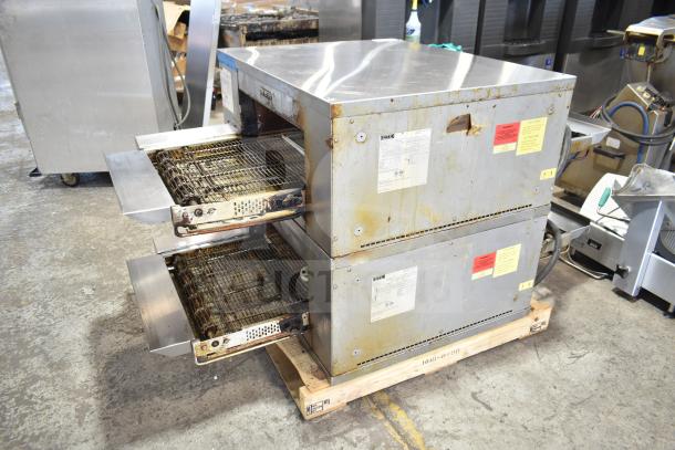Two 2022 Middleby Marshall CTX DZ33T stainless steel conveyor pizza ovens on casters, 208V, tested and working.