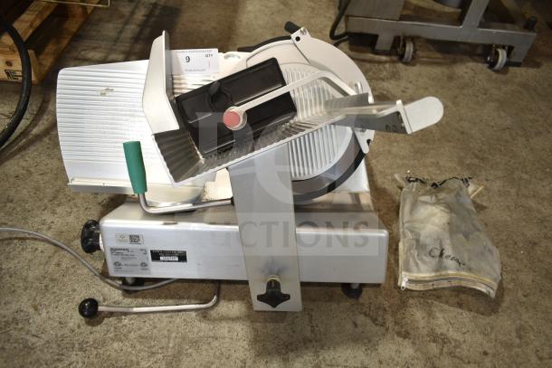 2019 Bizerba GSP H commercial meat slicer with blade sharpener, 120 volts, 1 phase, shown on a countertop.