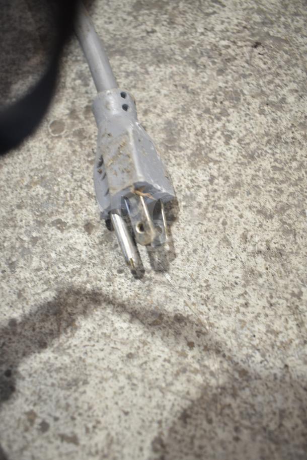 2019 Bizerba GSP H Commercial Meat Slicer plug on concrete ground, 120 Volts, 1 Phase.