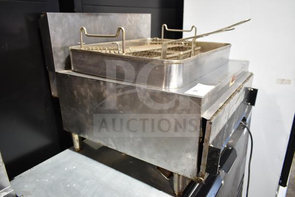 Star Max countertop deep fat fryer with baskets, stainless steel, used condition, visible control knob and power cord.