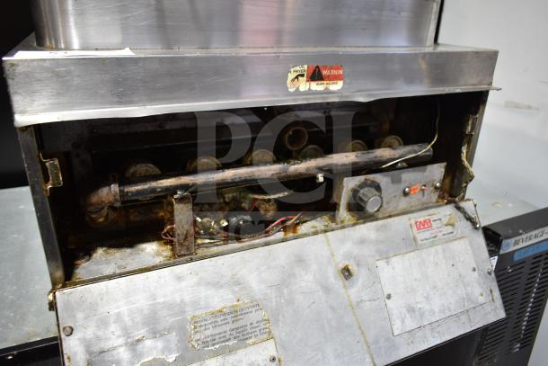 Star Max countertop deep fat fryer with baskets, used condition. Features control knob and visible wear. Warning label intact.