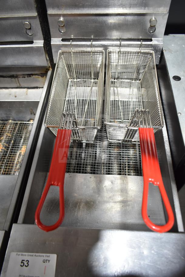 Pitco Frialator gas fryer with dual baskets and red handles, on commercial casters, used, stainless steel.