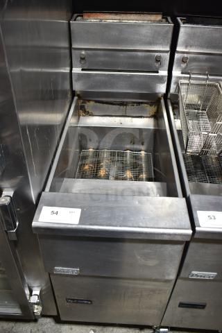 Pitco Frialator commercial gas fryer with worn exterior on casters, auction label "54 QTY 1" visible on front.