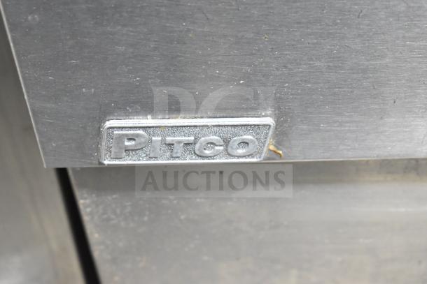 Metallic Pitco Frialator label on a commercial gas-powered deep fat fryer. Suitable for floor use, features commercial casters.