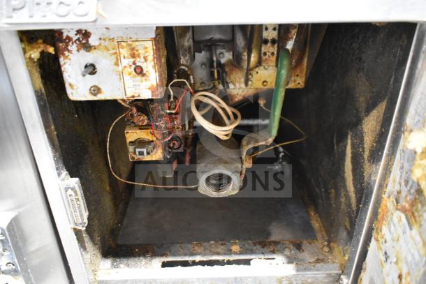 Pitco Frialator commercial gas fryer interior, showing wear and rust. Includes wiring and control panel details.