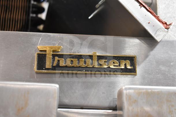 Traulsen RHT 2-32NUT Commercial Cooler, showcasing the brand logo on a stainless steel surface, for auction.