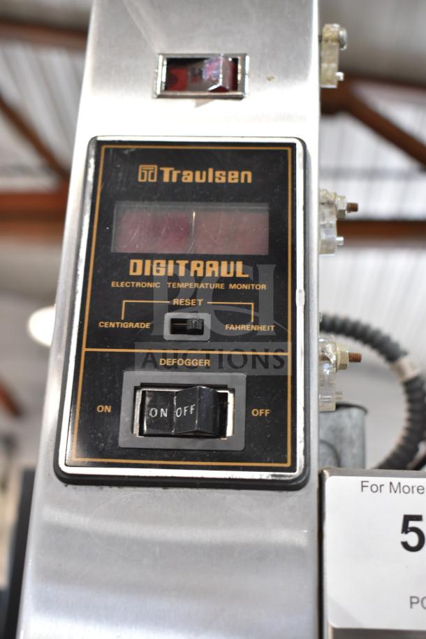 Traulsen RHT 2-32NUT cooler digital control panel with temperature monitor and defogger switch.
