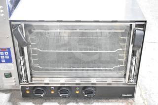 Brand new Vollrath COV-120-HS half-size countertop convection oven, 120 volts, showing control knobs and interior racks.