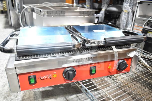 Avantco 177PG400 Commercial Dual Panini Grill, brand new, grooved plates, 19 5/8" x 9 1/8" surface, 120V, 1 Phase.