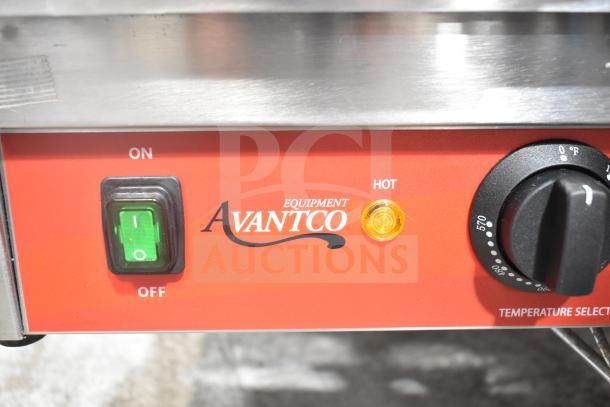 Brand new Avantco 177PG400 dual panini grill, grooved plates, 19 5/8" x 9 1/8" surface, 120V, shown with controls.