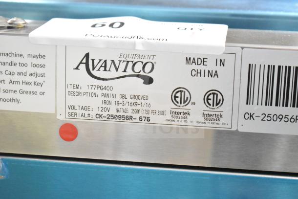Brand new Avantco 177PG400 dual panini grill with grooved plates, 19 5/8" x 9 1/8" surface, 120V, scratch and dent condition.