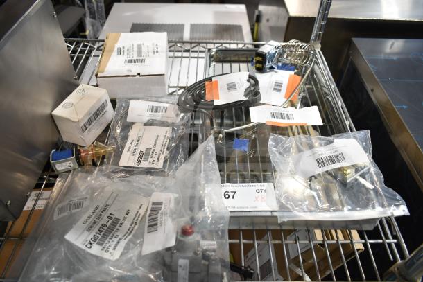 Eight brand new scratch and dent items, including relay, switch, and valve kit, labeled with barcodes and part numbers.