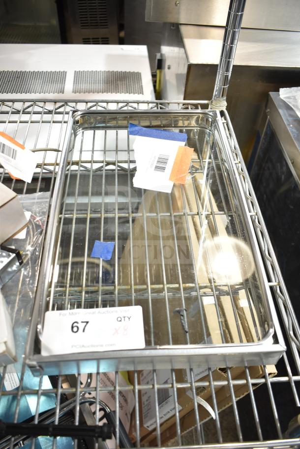 8 brand new scratch and dent items including relay, switch, valve kit on a metal shelf. Quantity tag displays "67, QTY x8."