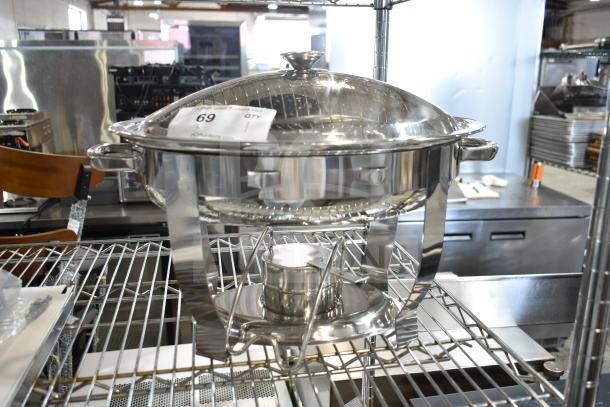 BRAND NEW Vollrath 46501 4 Qt. Orion Oval Chafer, stainless steel, lift-off lid, slight scratches, lot tag 69 visible.