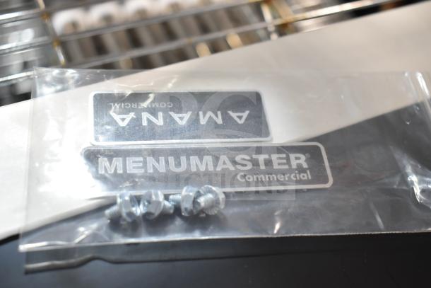 "Amana Menumaster commercial parts in sealed bag with screws visible, brand new condition, including a blower wheel."