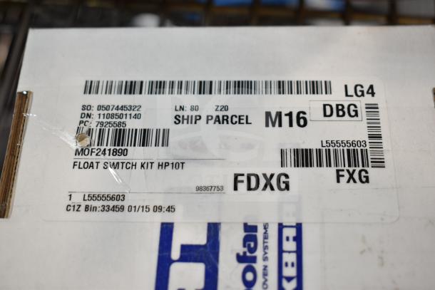 Box with label showing Float Switch Kit HP10T, part number MOF241890, in new condition, marked for shipping.