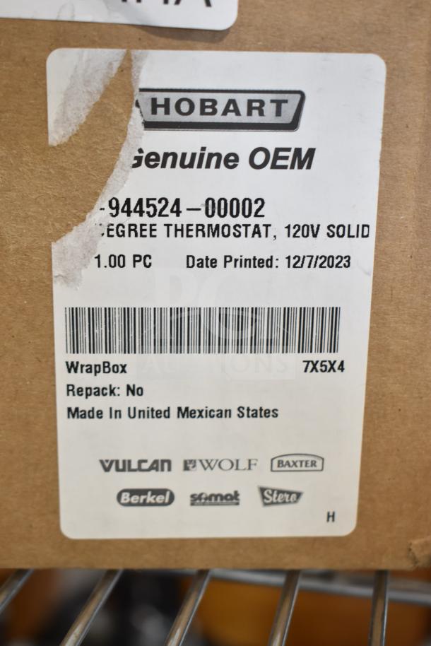 Box displaying Hobart genuine OEM label for a 120V thermostat, model 944524-00002, printed 12/7/2023. Made in Mexico.
