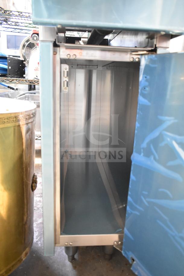 US Range Commercial Counter, stainless steel interior, open door view, sturdy construction, suitable for restaurant use.