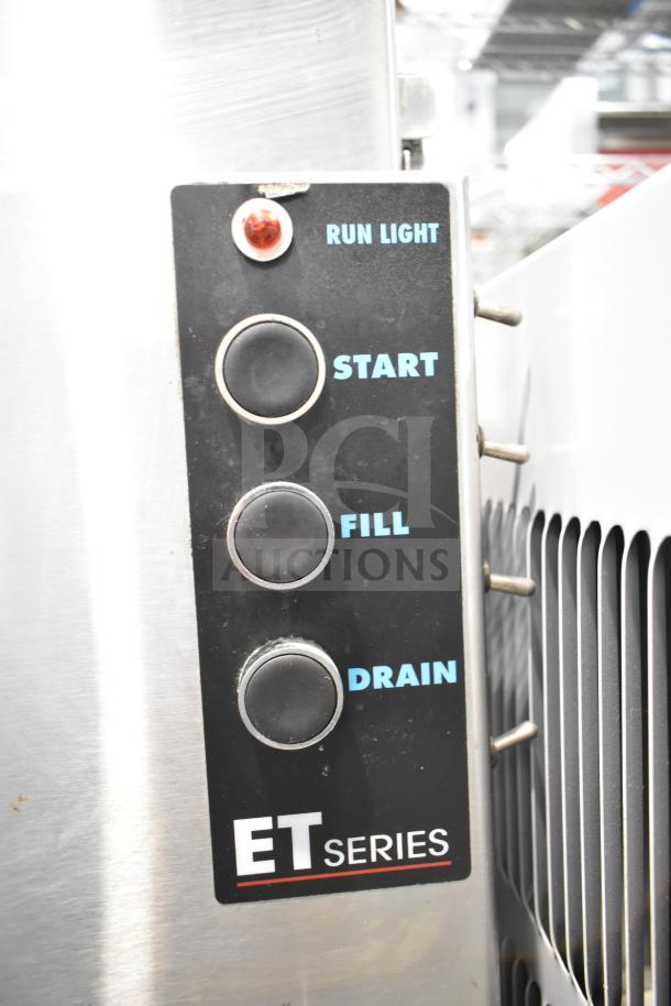 American Dish Service ET Series commercial glass washer with control panel featuring start, fill, and drain buttons.