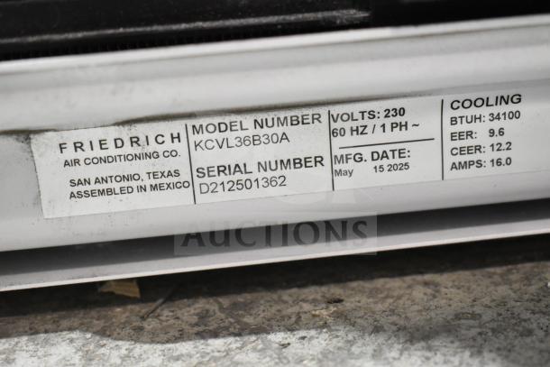 Friedrich KCVL36B30A air conditioner label showing model, serial number, voltage, and BTU details.