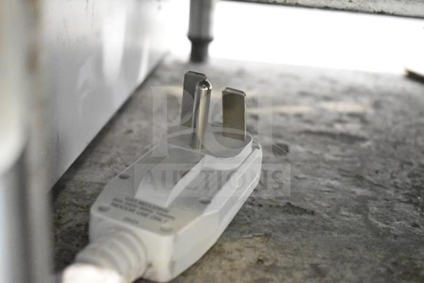 Power plug of Friedrich KCVL36B30A air conditioner. 230 volts, grounded, three-prong.