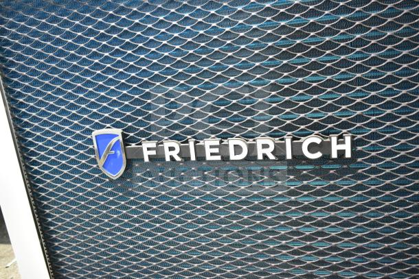 Friedrich air conditioner grill showcasing logo, model KCVL36B30A, 34,000 BTU, slide-out chassis, 230V, 1 phase.