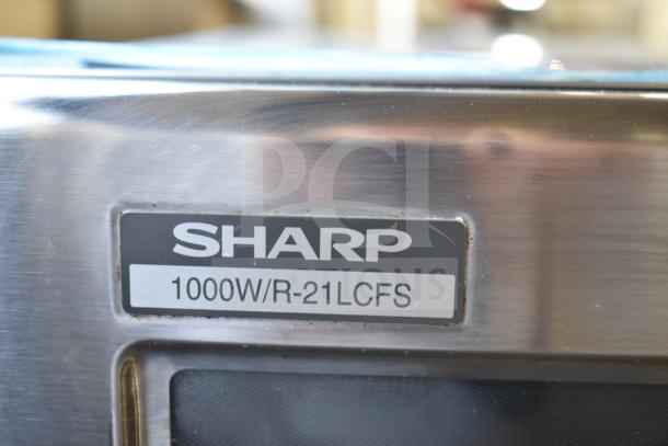 Sharp R-21LCFS Countertop Microwave Oven, 1000W, stainless steel, clear label, excellent condition.