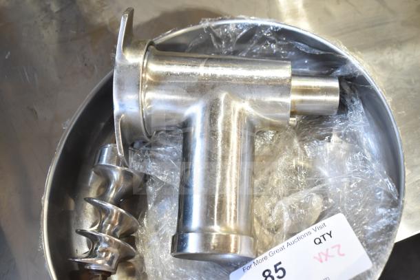 Stainless steel meat grinder attachment with auger and tray, good condition. Includes auction tag showing quantity.