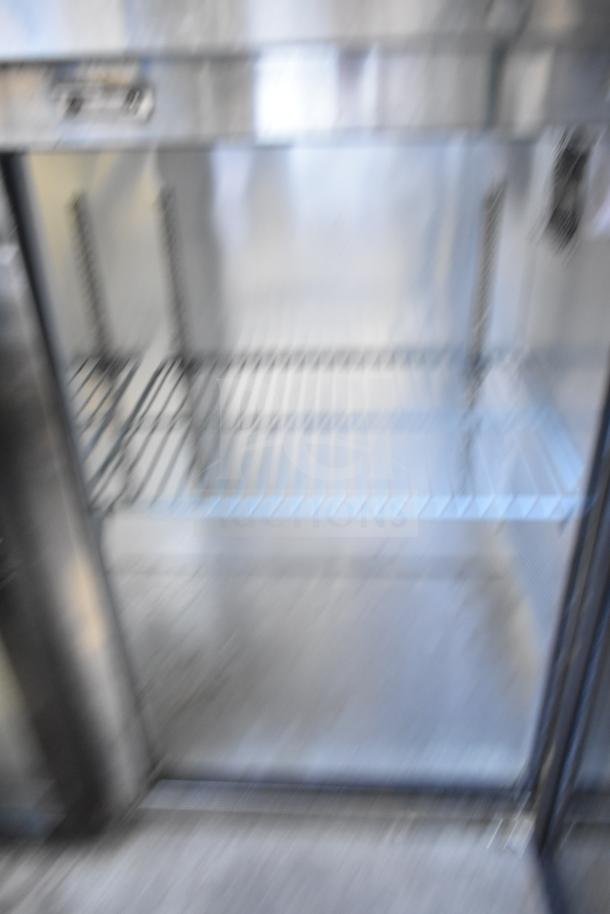 Spartan SGBB-79 commercial 3-door back bar cooler, metal shelves, 115V, 1 Phase, model SGBB-79, for merchandising.