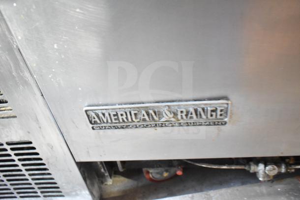 American Range logo on a stainless steel commercial 6 burner range with flat top, two ovens, over shelf, and back splash.