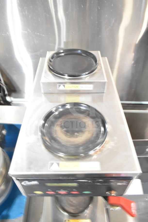 Curtis ALP3GT12A000 commercial coffee machine with 3 burners, hot water dispenser, 120V, caution labels visible, good condition.