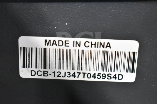 SentrySafe Metal Cash Box label showing "Made in China" and barcode DCB-12J347T0459S4D.